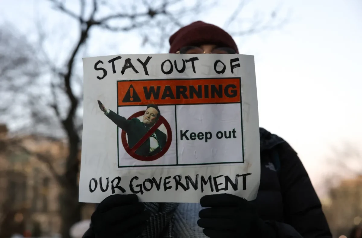 Demonstrators gather outside the Office of Personnel Management in Washington, DC, on February 7, 2025.