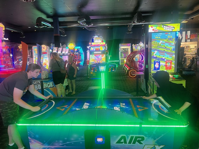 Micheal vs. Nelson playing air hockey