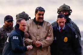 Nicolas maduro being draged to court by united states federal agents 