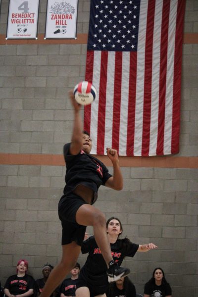 Kai hitting the volleyball 